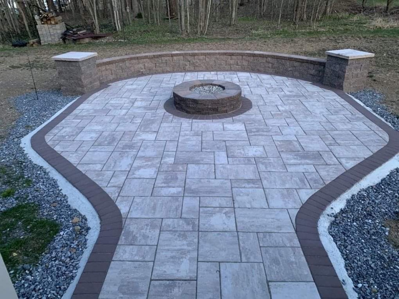 Circular paver patio with center fire pit base