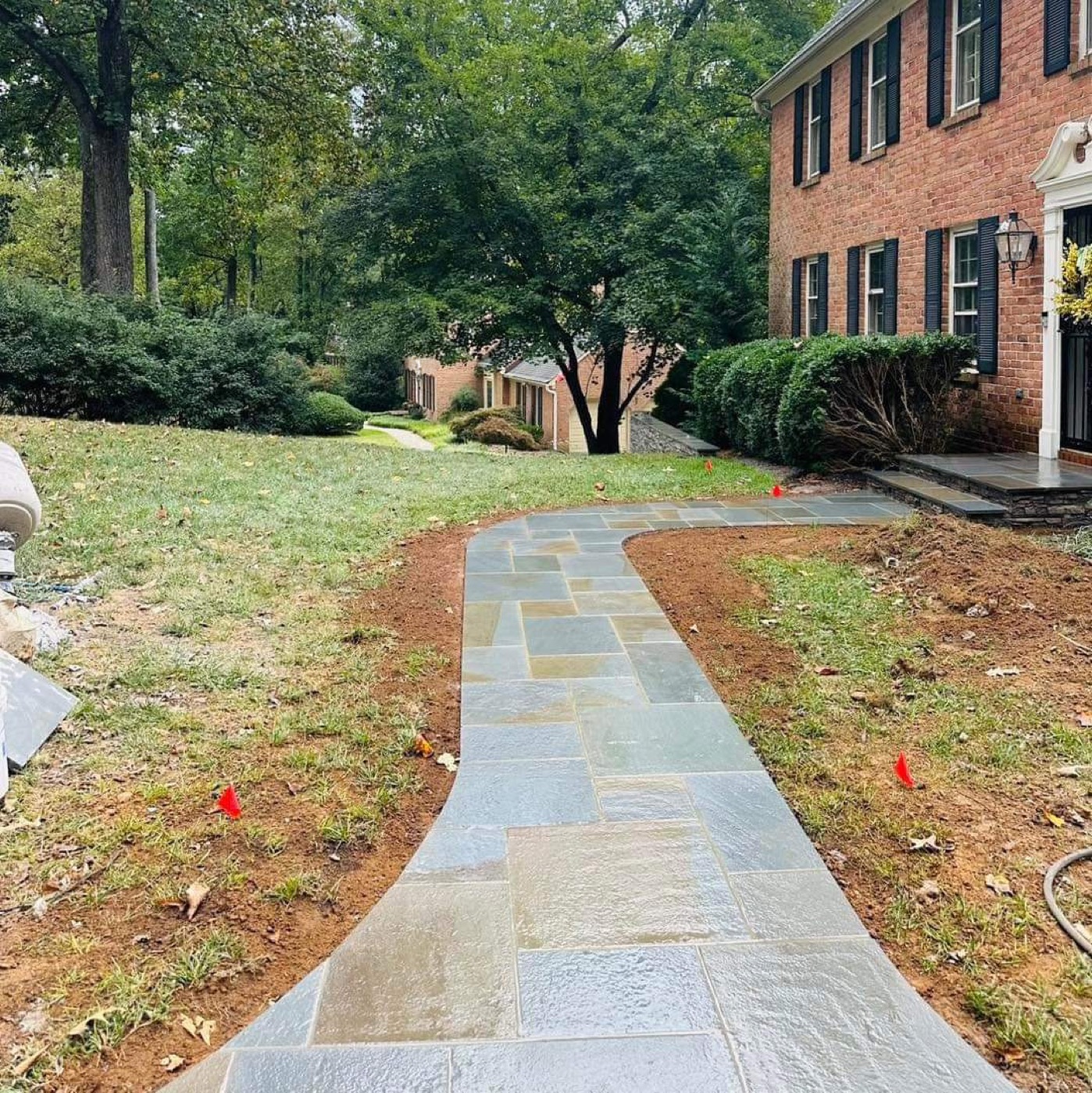 Flagstone walkway with rock and landscape edging
