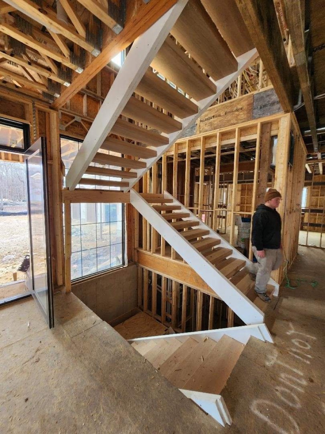Interior stair framing progress before finish work